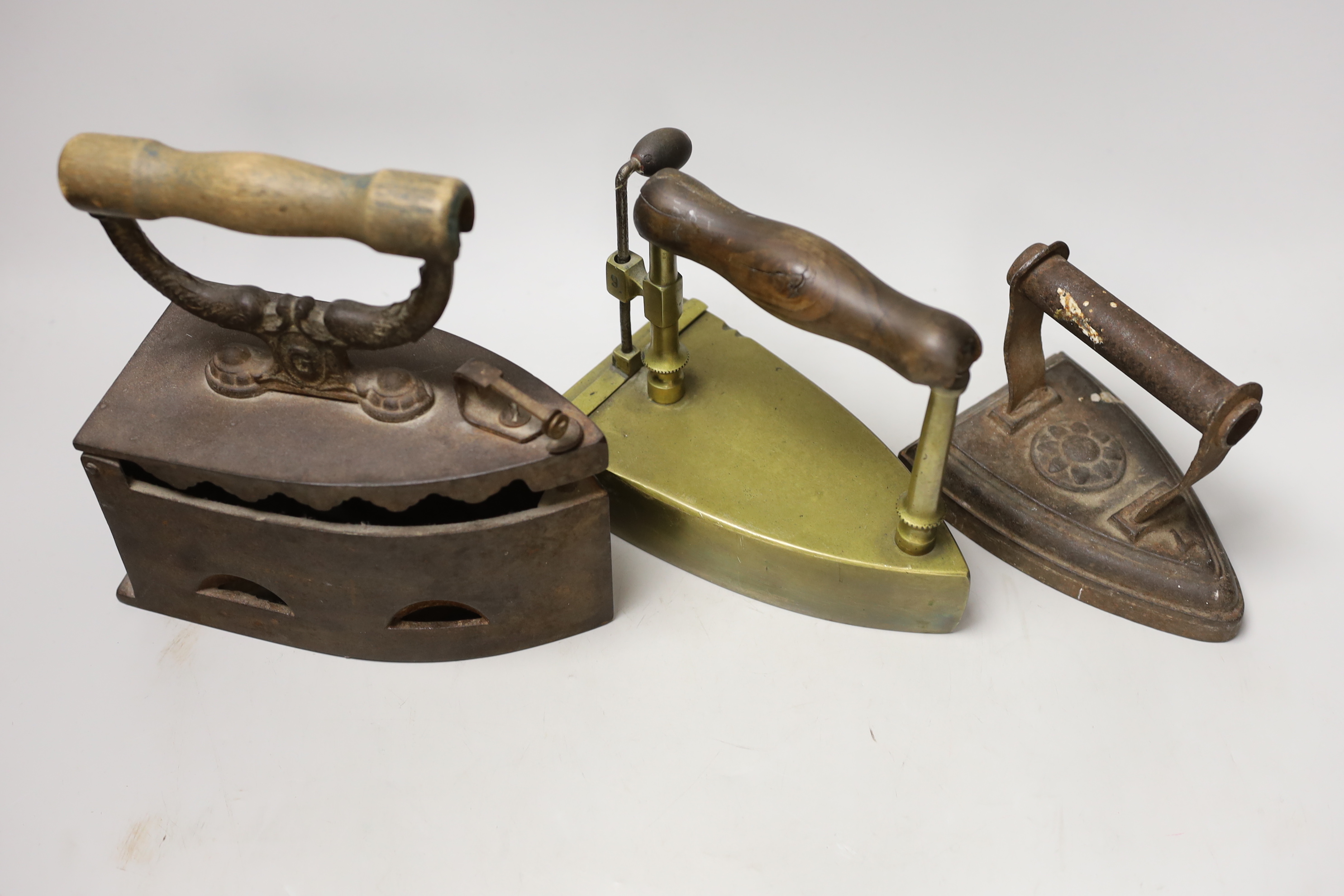 Three 19th century irons, tallest 23cms high